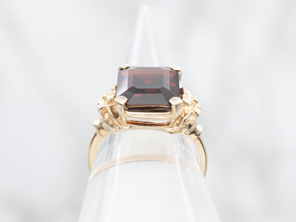 Vintage Gold and Garnet Ring with Flower Detail