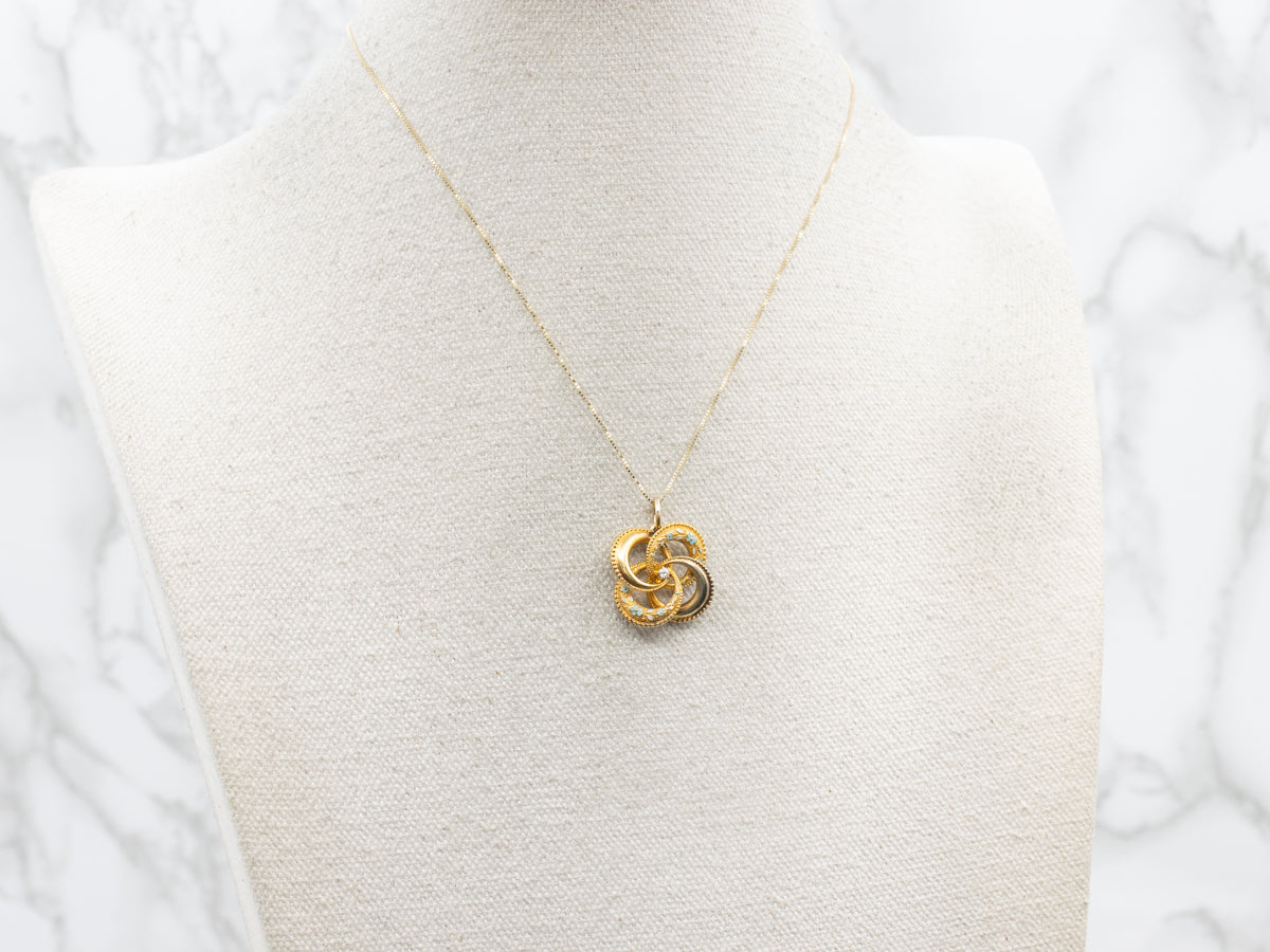 Art Nouveau Old Mine Cut Diamond and Enamel Floral Lovers Knot Pendant