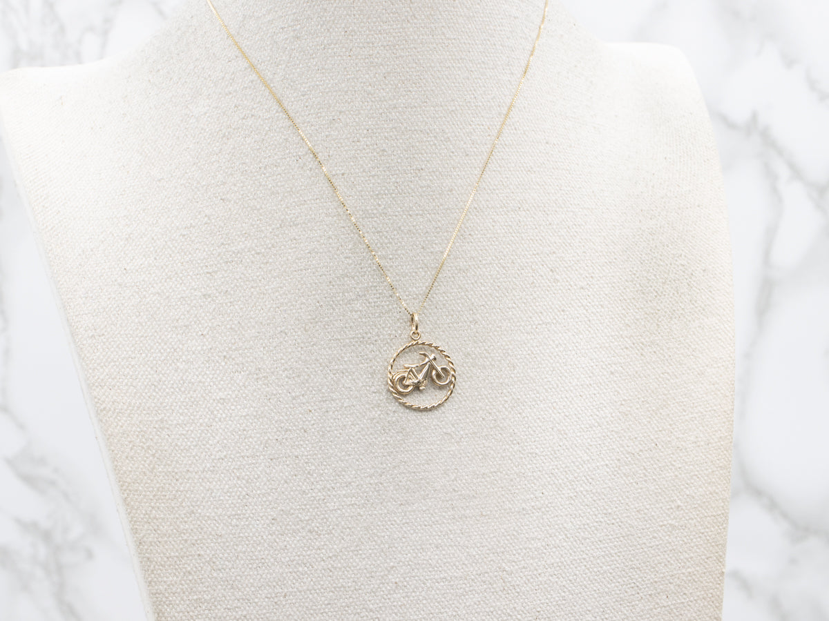 Gold Bicycle Pendant in Twisted Frame