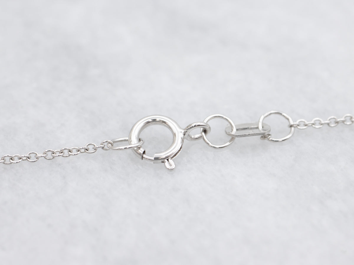 Blue Sapphire and Diamond Halo Pendant Necklace