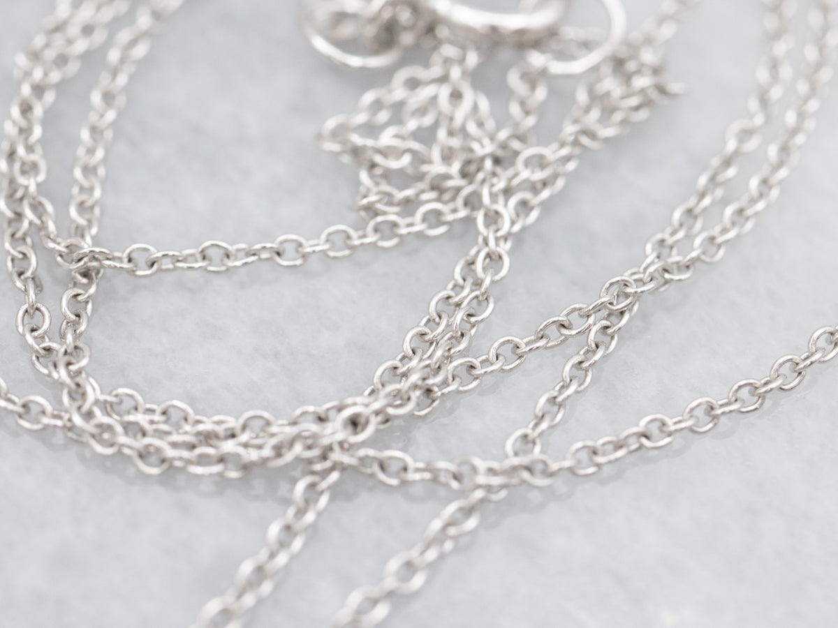 Blue Sapphire and Diamond Halo Pendant Necklace