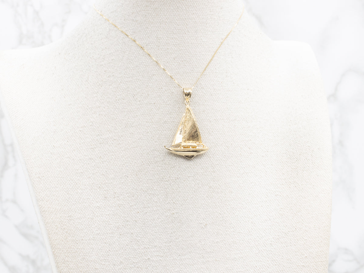 Gold Sailboat Pendant with Textured Sail