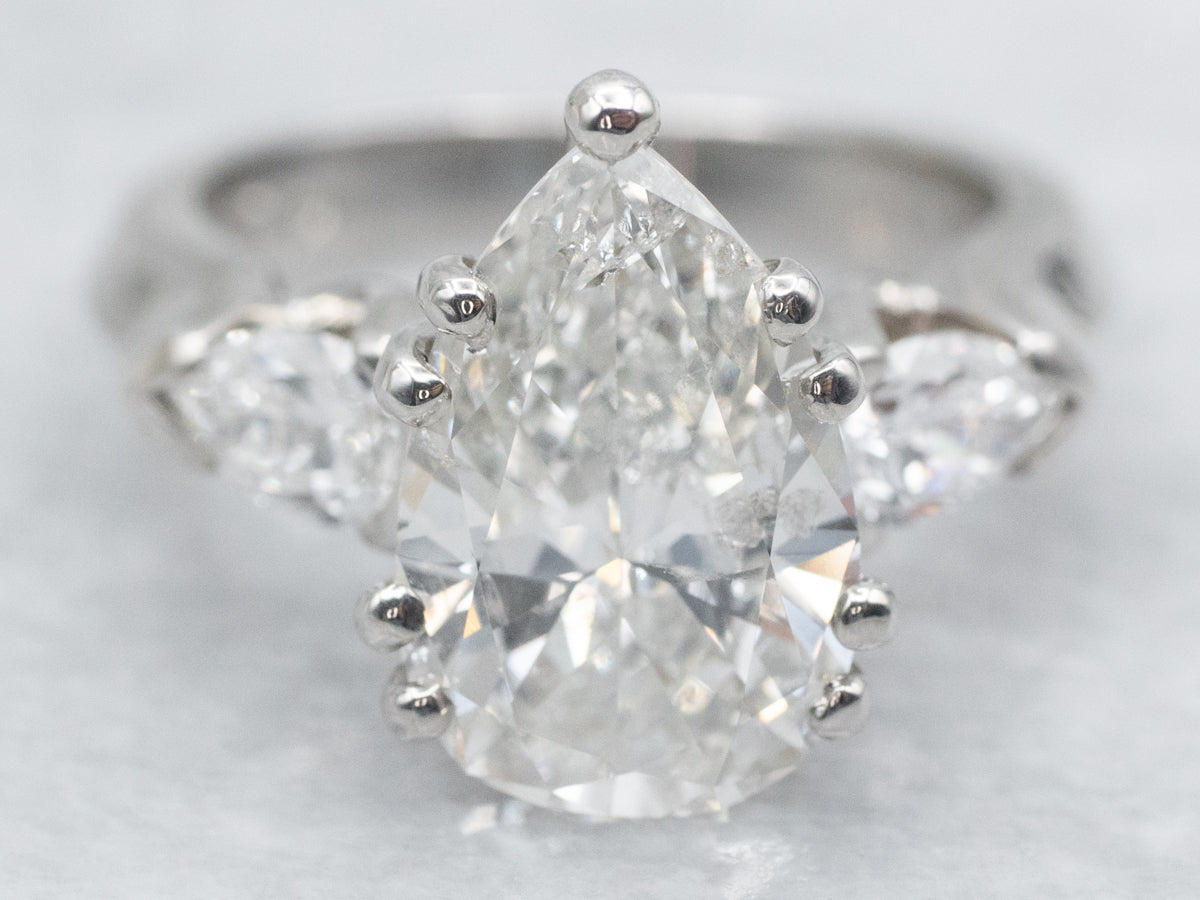 GIA Certified Pear Cut Diamond Three Stone Engagement Ring