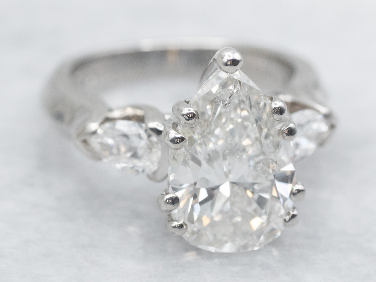 GIA Certified Pear Cut Diamond Three Stone Engagement Ring