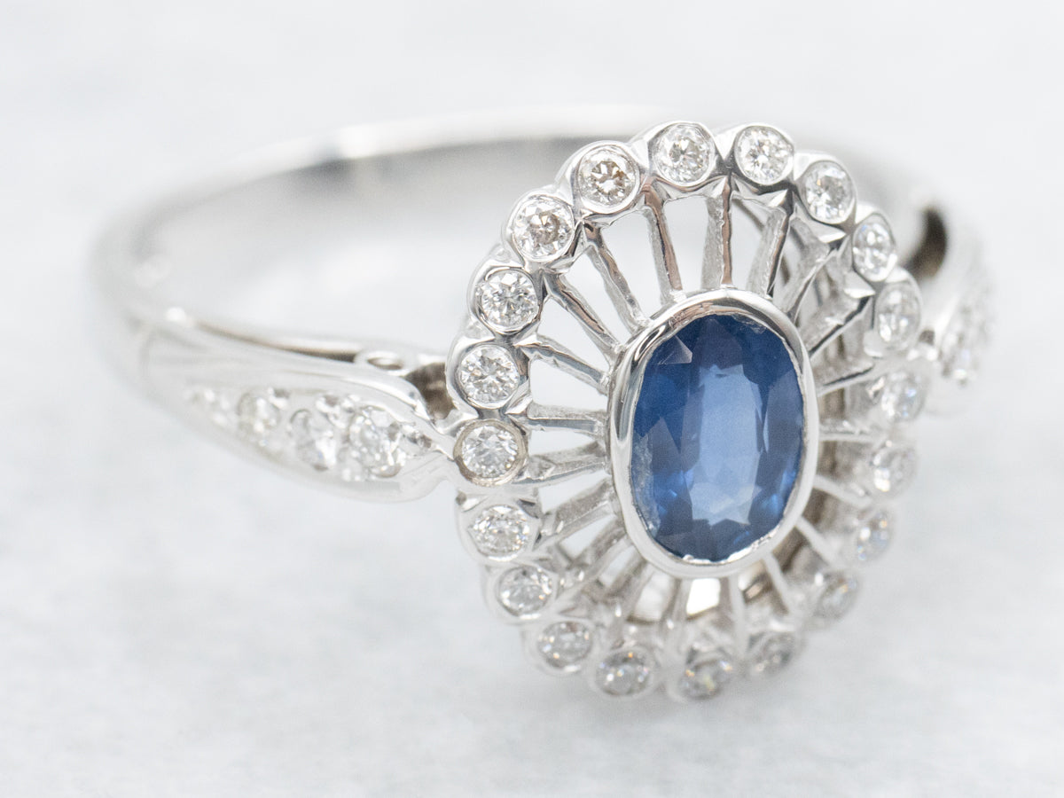 Vintage Sapphire and Diamond Halo Engagement Ring