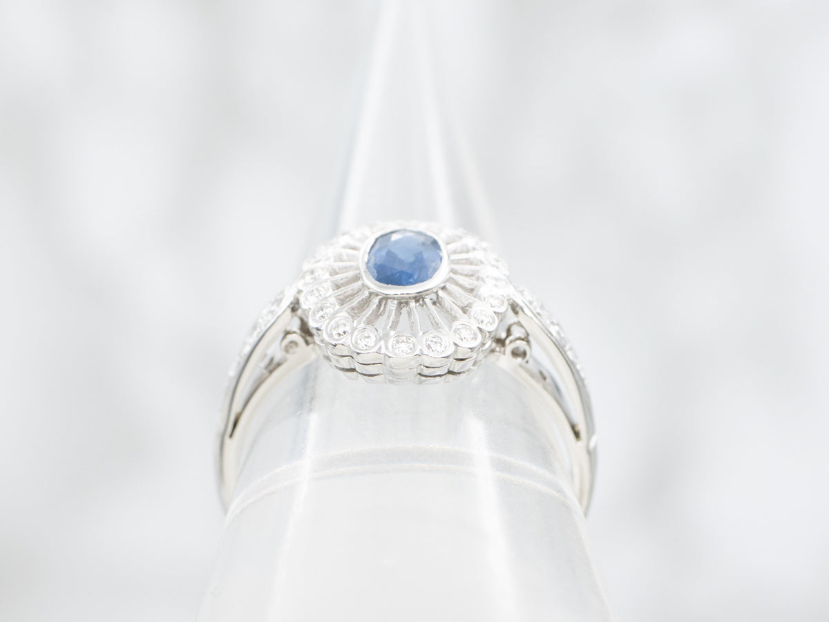 Vintage Sapphire and Diamond Halo Engagement Ring