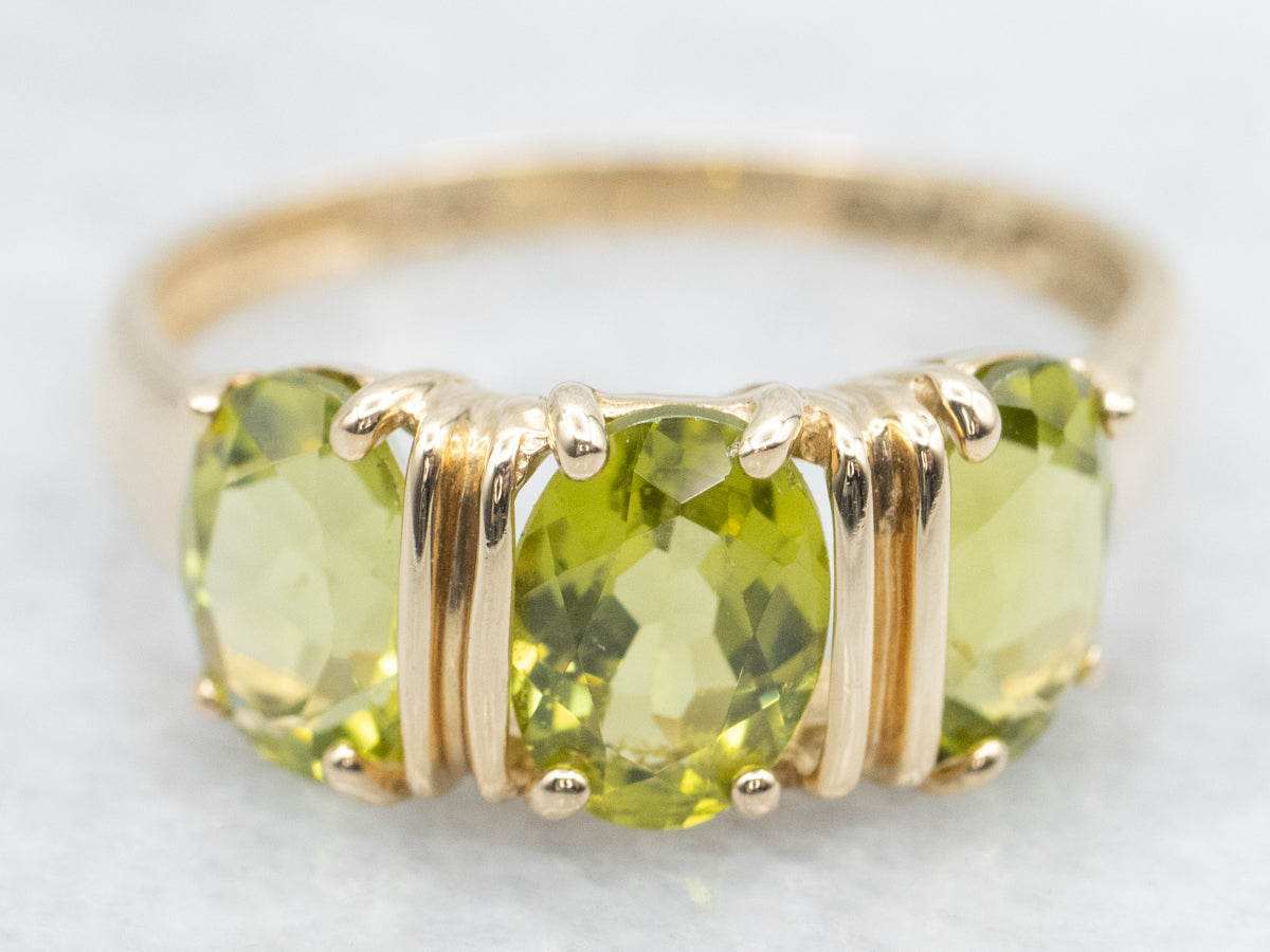 Three Stone Gold and Peridot Ring