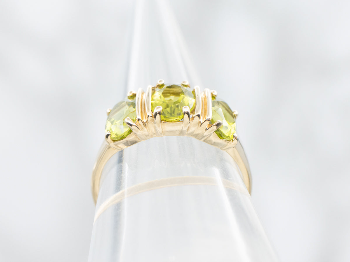 Three Stone Gold and Peridot Ring