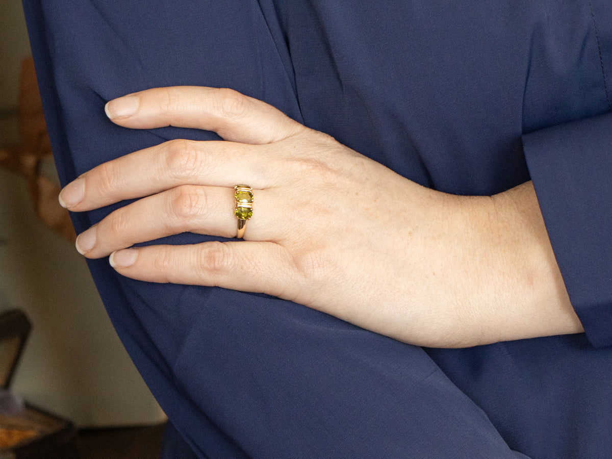 Three Stone Gold and Peridot Ring