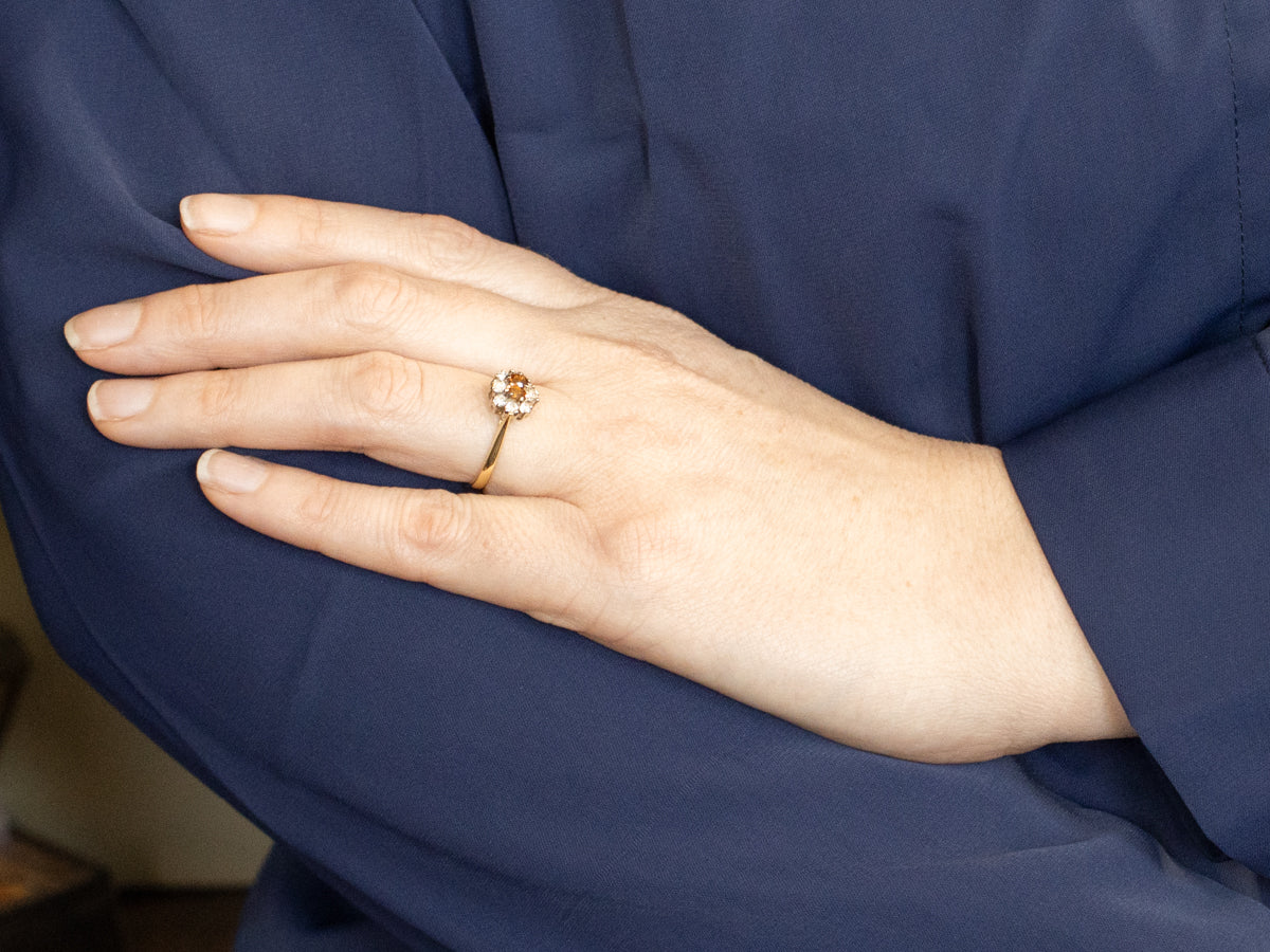 Stunning Spessartite Garnet and Diamond Halo Ring