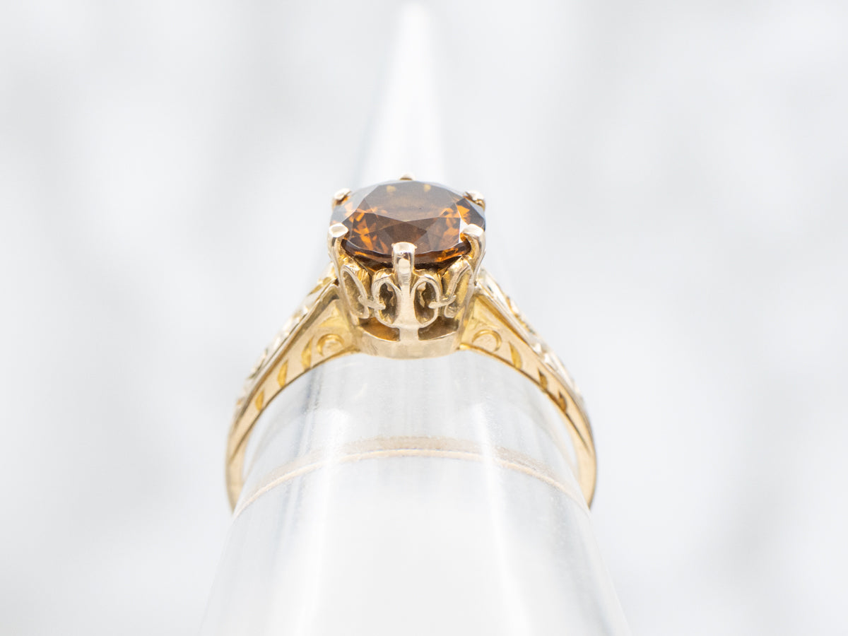 Mali Garnet Solitaire Ring with Ornate Gold Shoulders