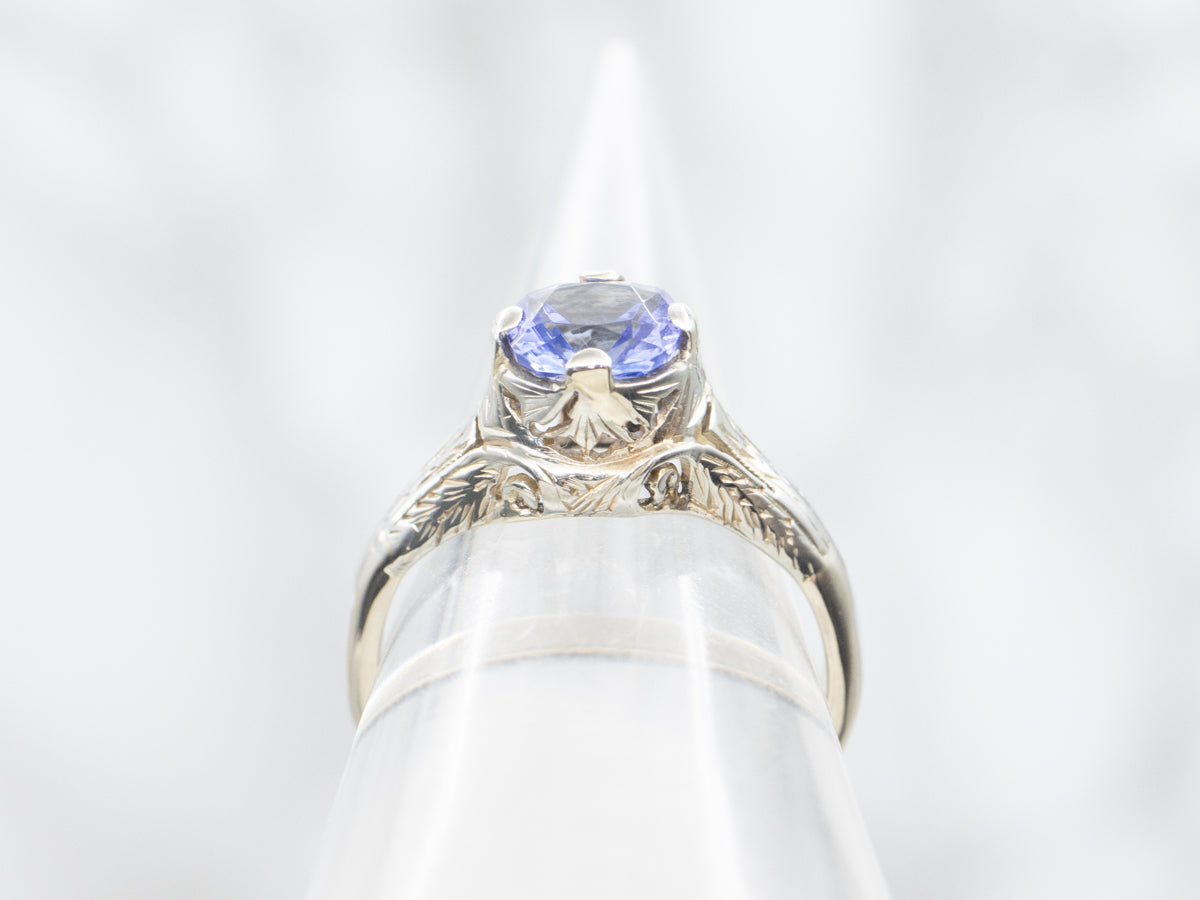 Art Deco Tanzanite Solitaire Ring with Etched Filigree Shoulders
