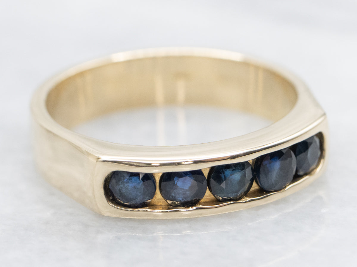 Channel Set Sapphire and Gold Band