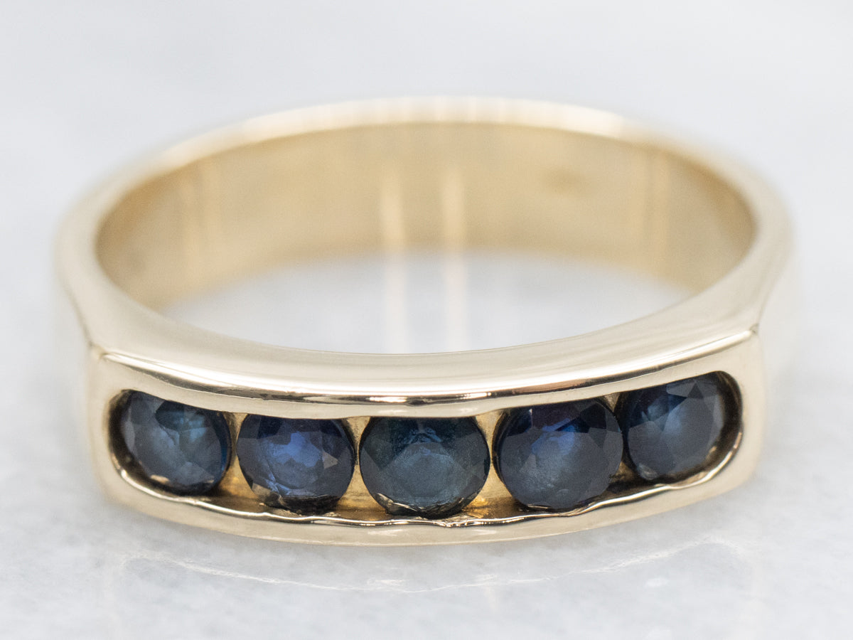 Channel Set Sapphire and Gold Band