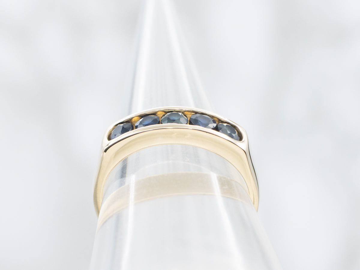 Channel Set Sapphire and Gold Band