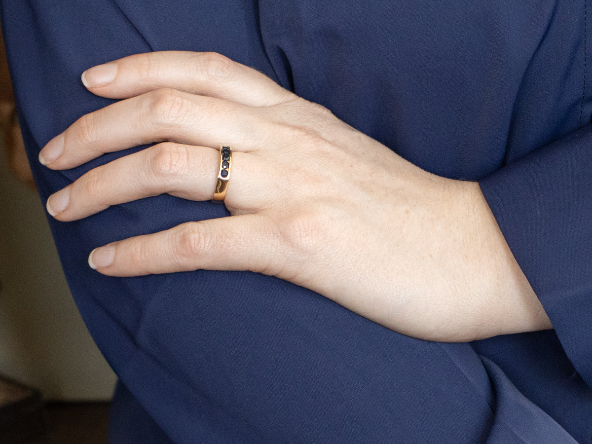 Channel Set Sapphire and Gold Band