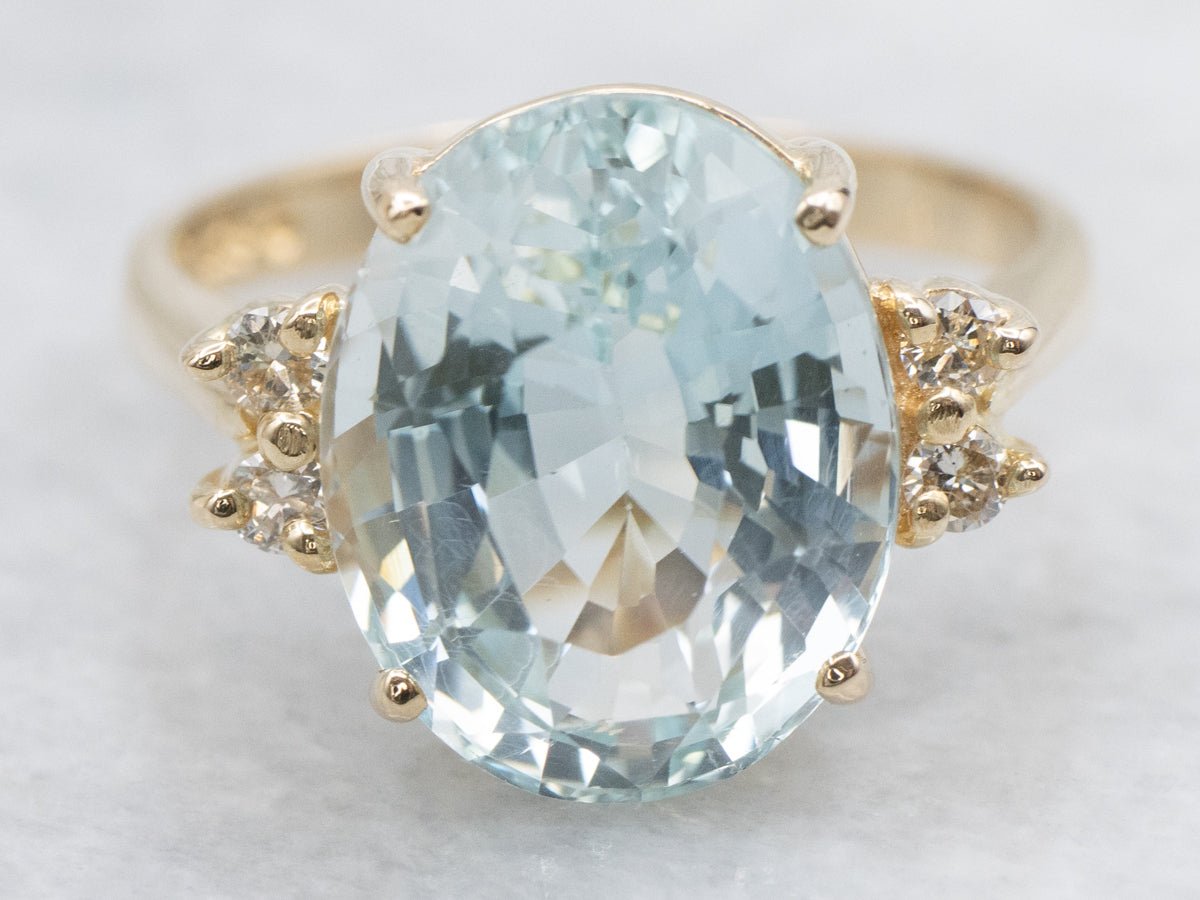 Yellow Gold Blue Topaz and Diamond Ring