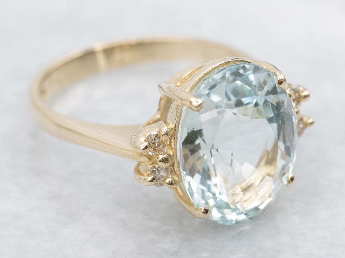 Yellow Gold Blue Topaz and Diamond Ring