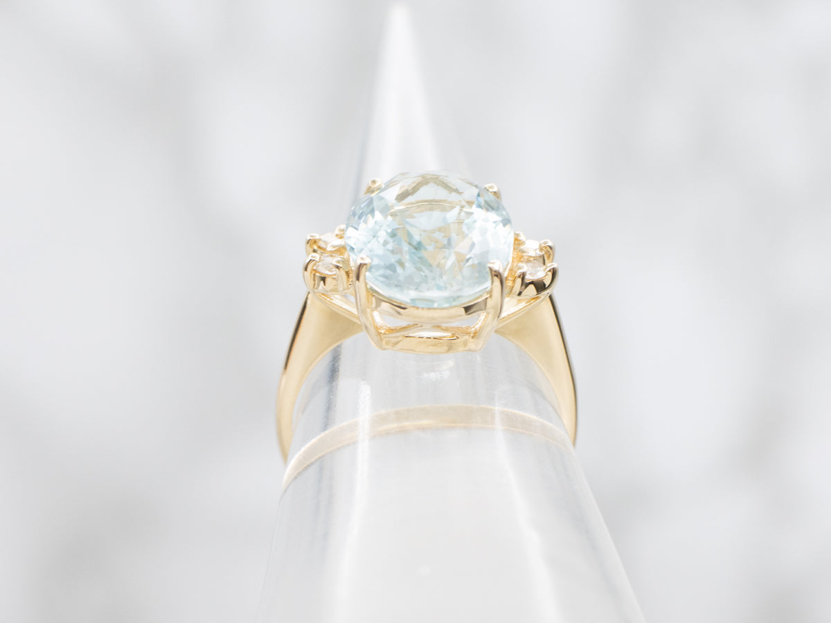 Yellow Gold Blue Topaz and Diamond Ring