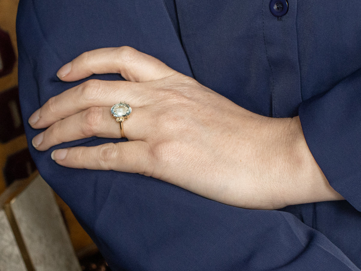 Yellow Gold Blue Topaz and Diamond Ring