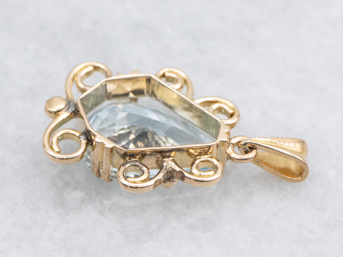 Pear Cut Aquamarine Pendant in Scrolling Gold Frame