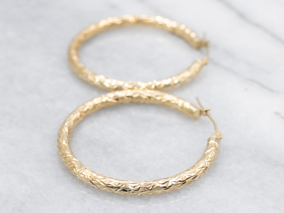 Faceted Yellow-Gold Tube Hoop Earrings