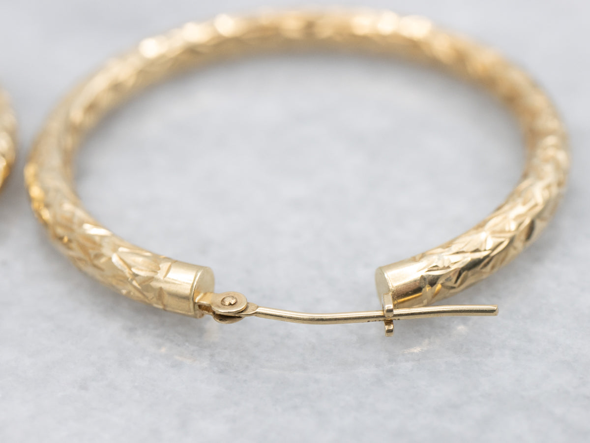 Faceted Yellow-Gold Tube Hoop Earrings