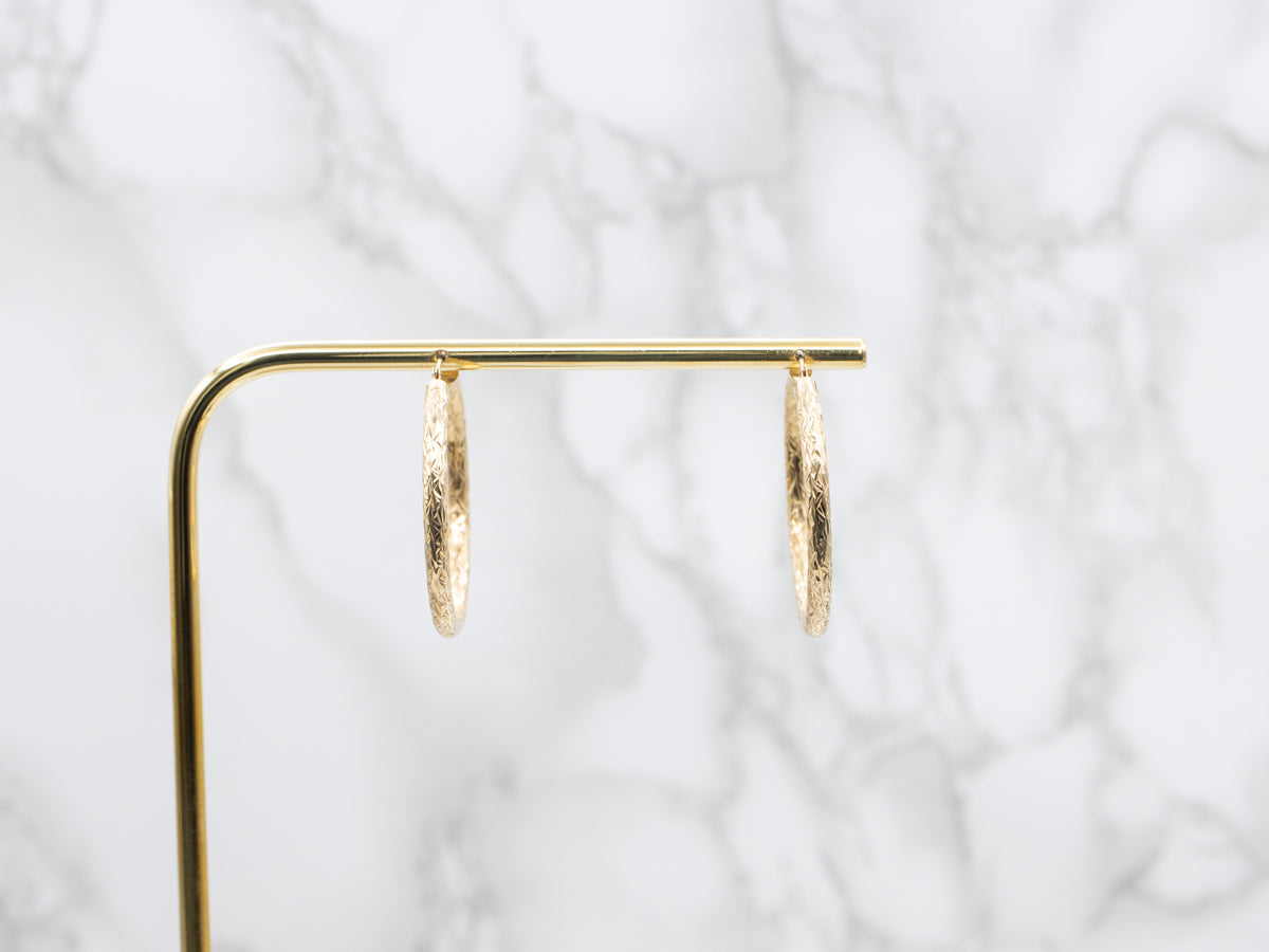 Faceted Yellow-Gold Tube Hoop Earrings