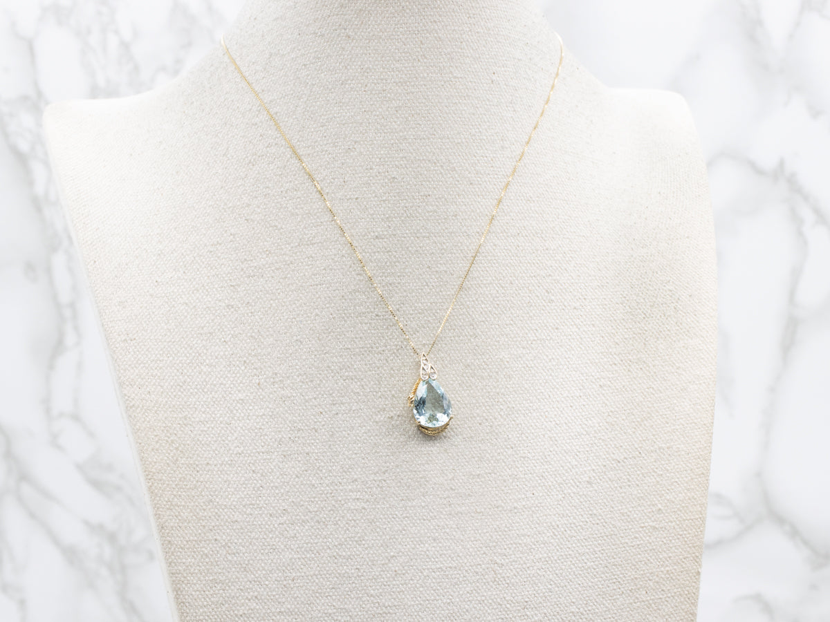 Modern Gold Aquamarine and Diamond Pendant
