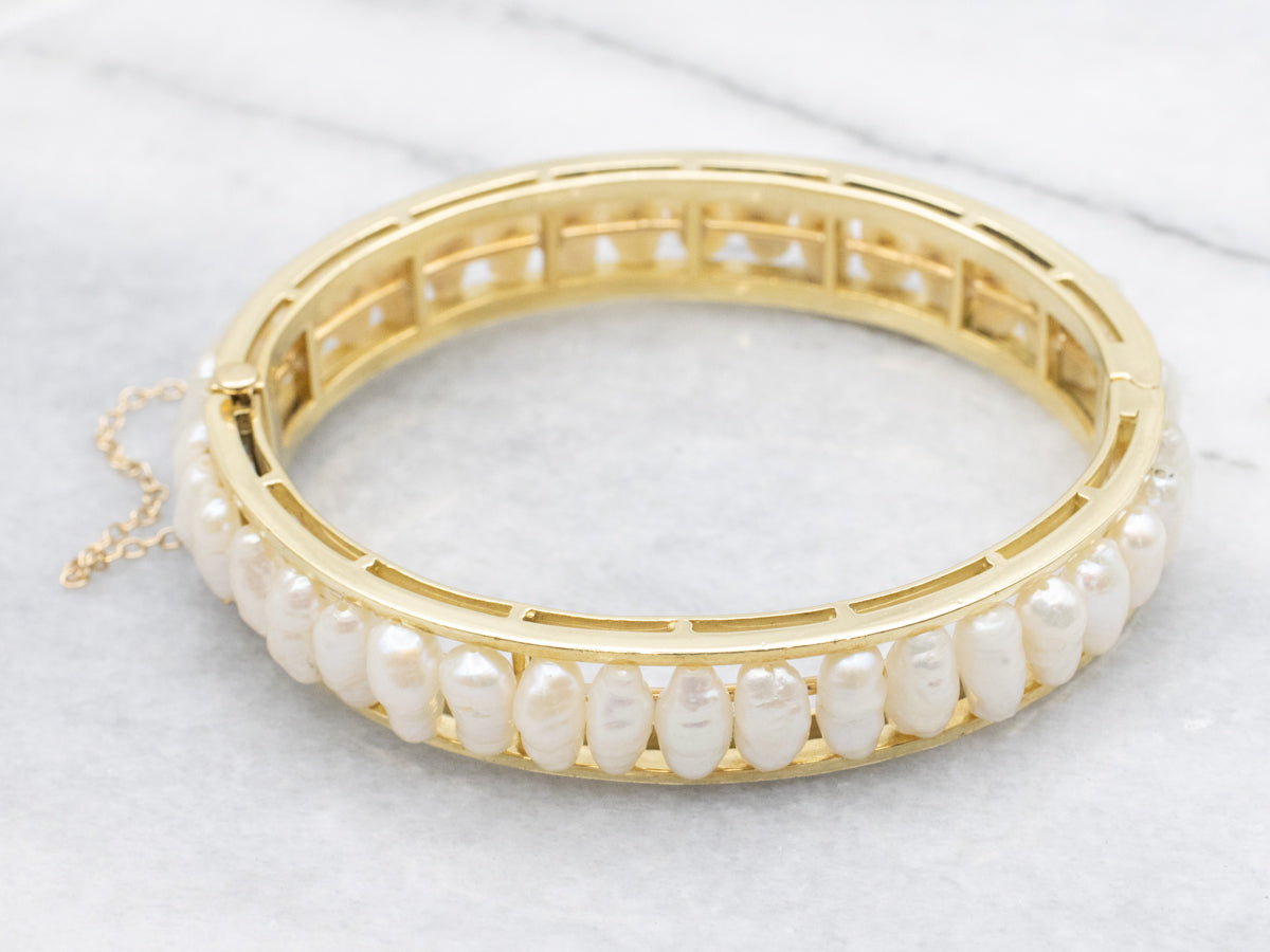 Gold and Pearl Hinged Oval Bangle Bracelet