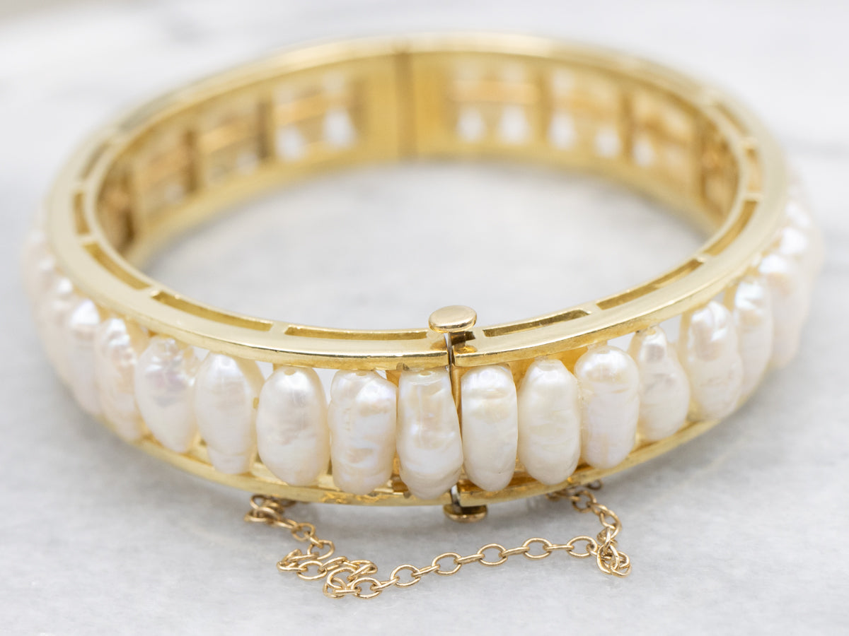 Gold and Pearl Hinged Oval Bangle Bracelet