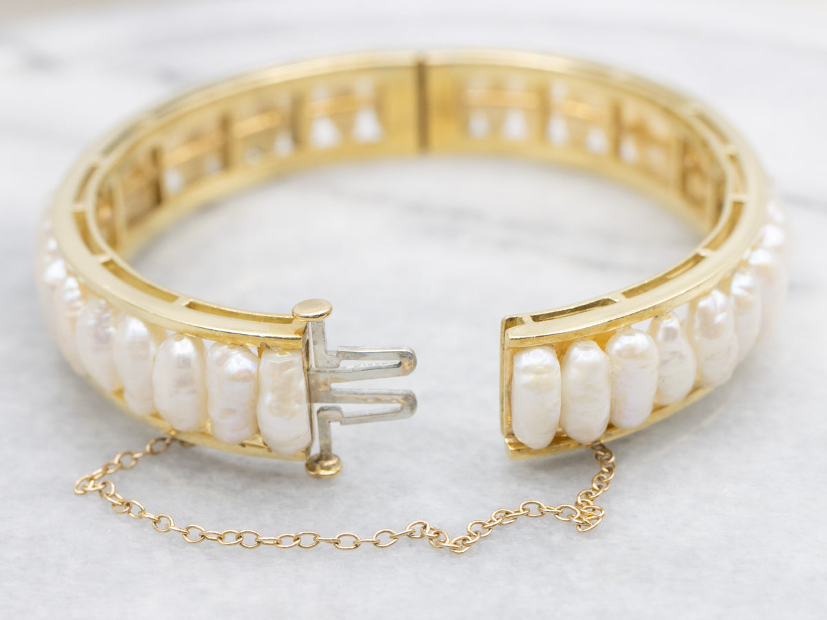 Gold and Pearl Hinged Oval Bangle Bracelet