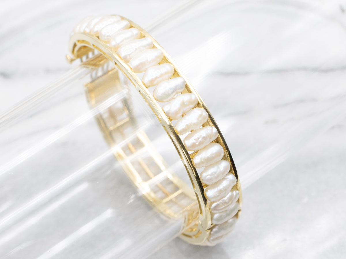 Gold and Pearl Hinged Oval Bangle Bracelet