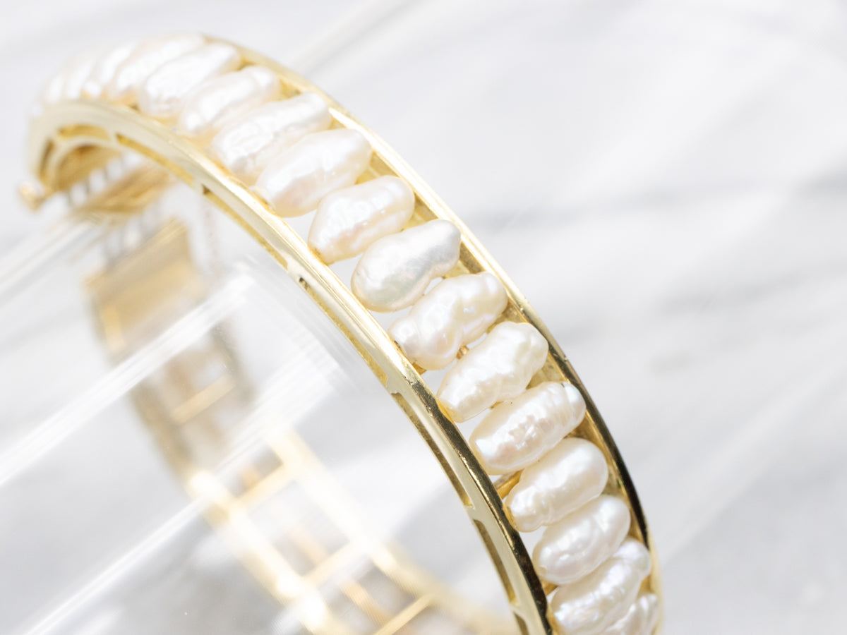 Gold and Pearl Hinged Oval Bangle Bracelet