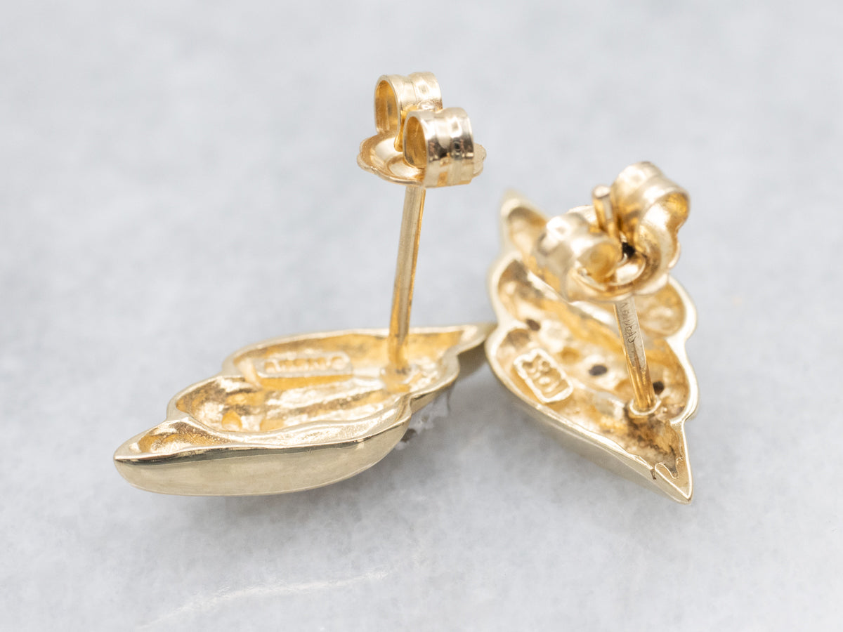 Gold and Diamond Swirl Stud Earrings