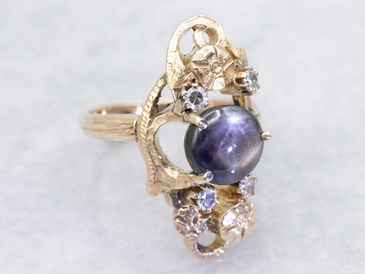 Rare 12-Ray Black Star Sapphire and Diamond Floral Dinner Ring