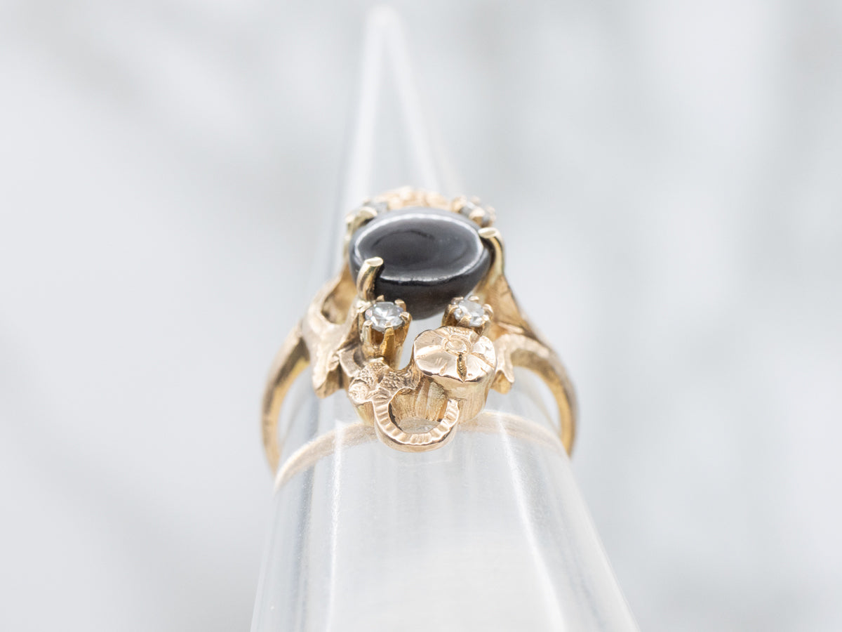 Rare 12-Ray Black Star Sapphire and Diamond Floral Dinner Ring
