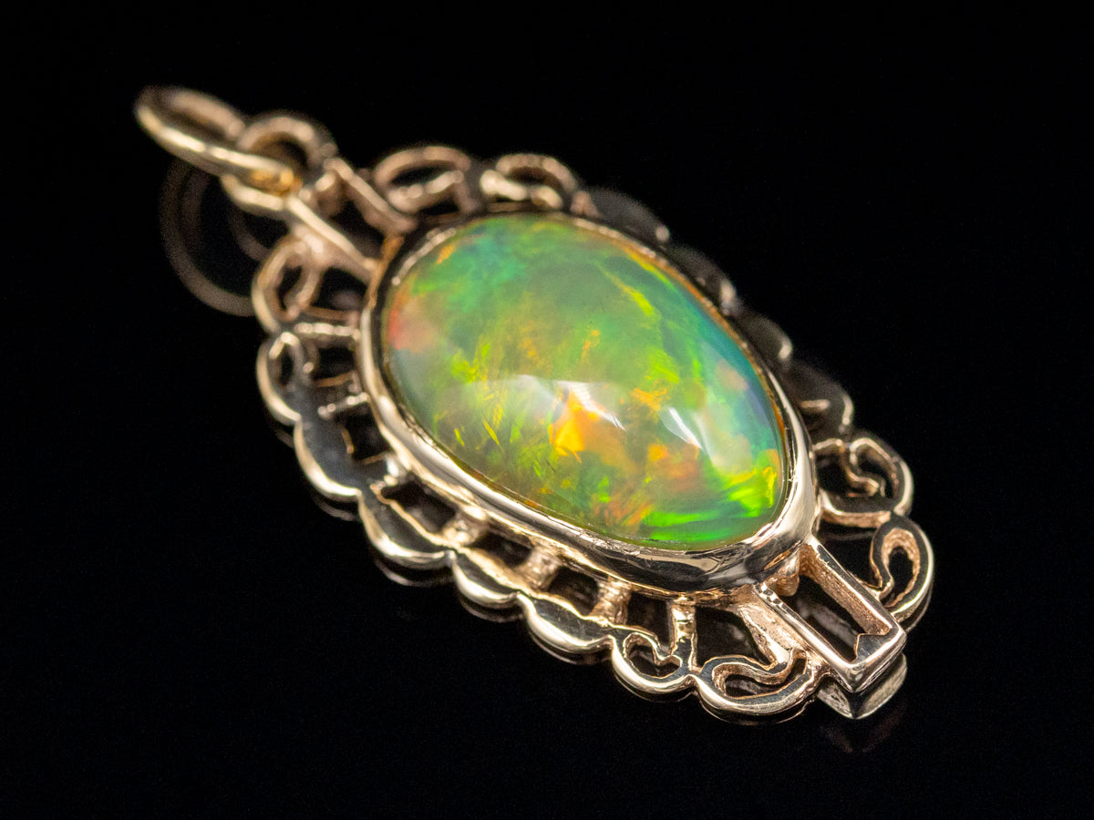 Looping Gold Opal Solitaire Pendant