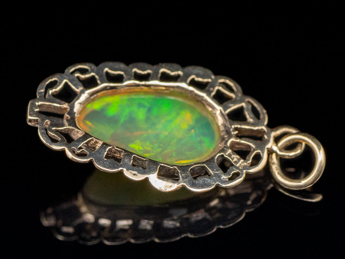 Looping Gold Opal Solitaire Pendant