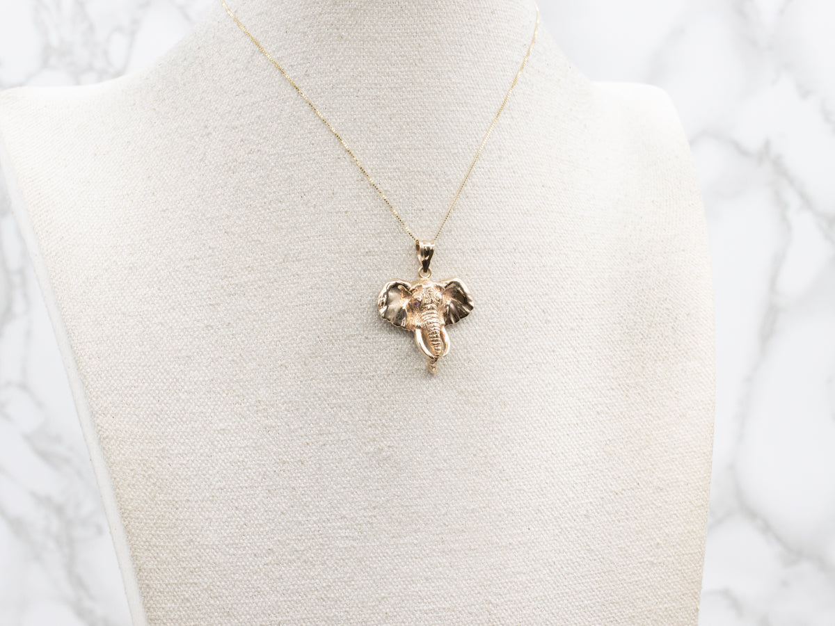 Ruby Polished Gold Elephant Pendant
