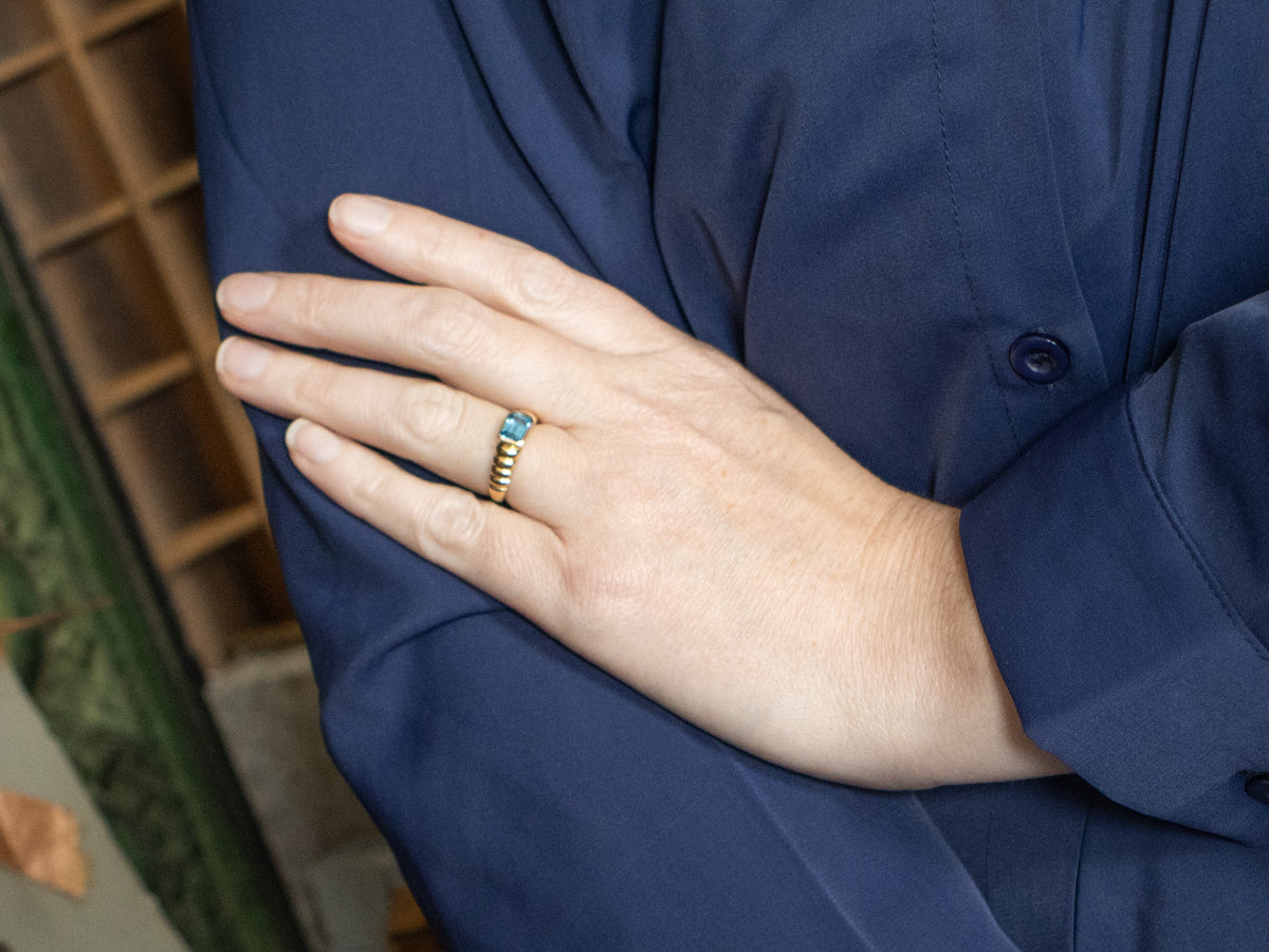 East-to-West Set Blue Topaz Gold Solitaire Ring