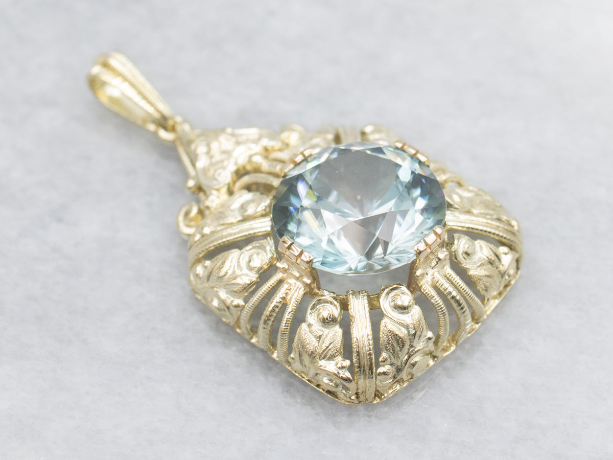 Ornate Blue Zircon Gold Cocktail Pendant