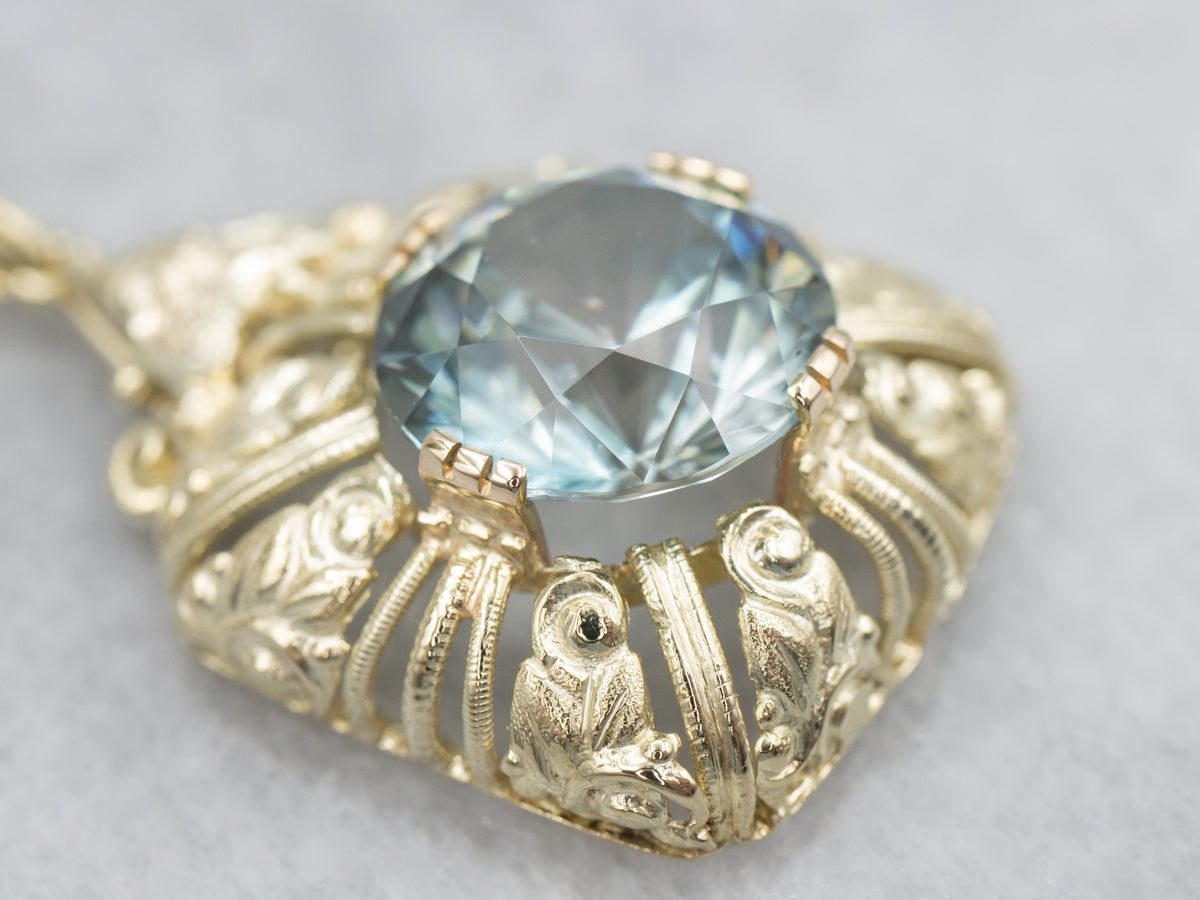 Ornate Blue Zircon Gold Cocktail Pendant