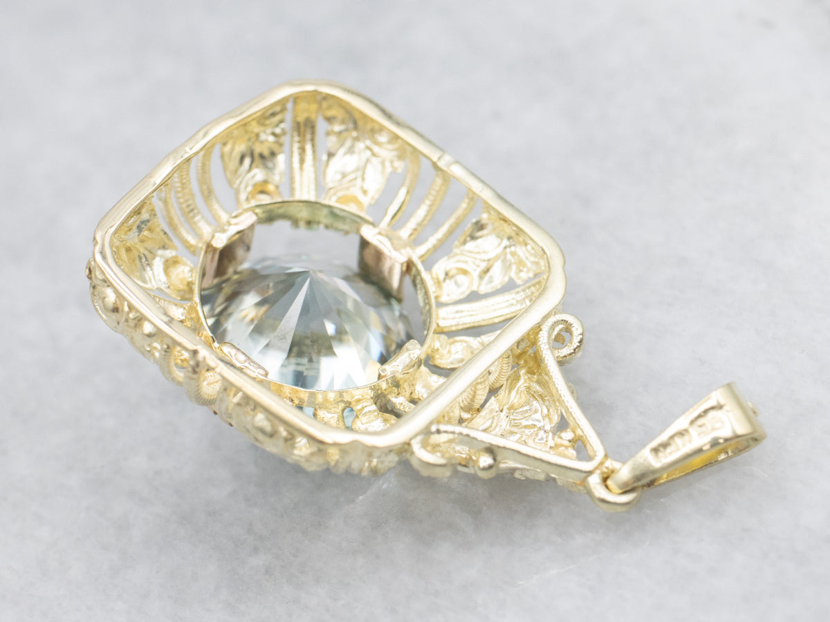 Ornate Blue Zircon Gold Cocktail Pendant
