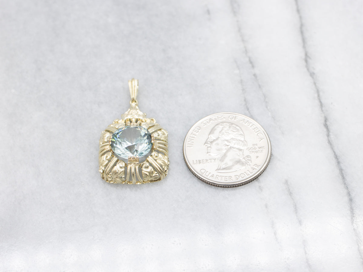 Ornate Blue Zircon Gold Cocktail Pendant