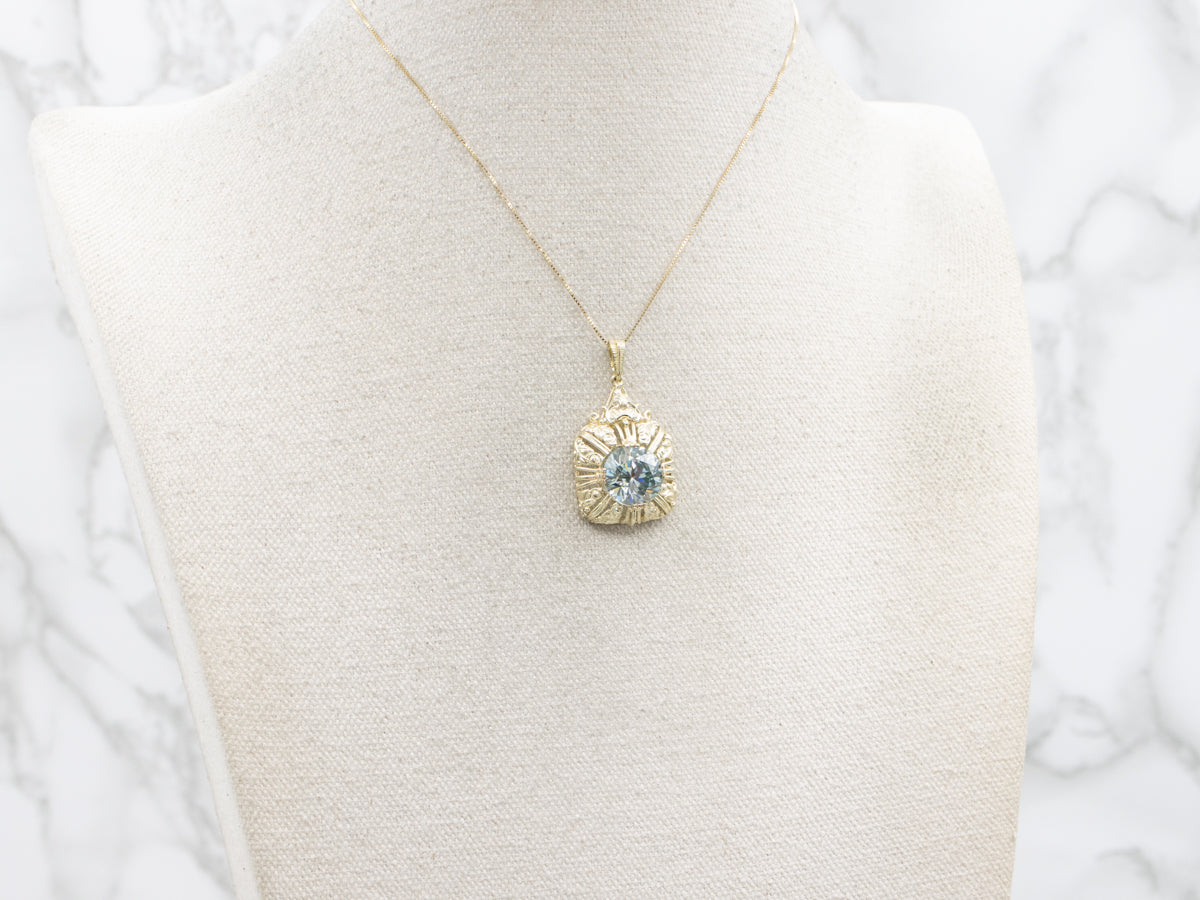 Ornate Blue Zircon Gold Cocktail Pendant