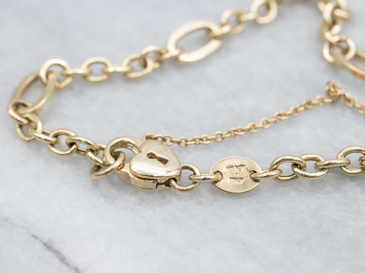Gold Link Bracelet with Heart Lock Clasp and Safety Chain