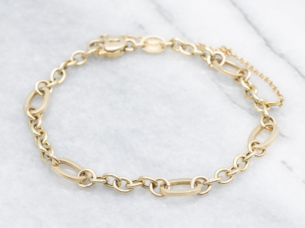 Gold Link Bracelet with Heart Lock Clasp and Safety Chain