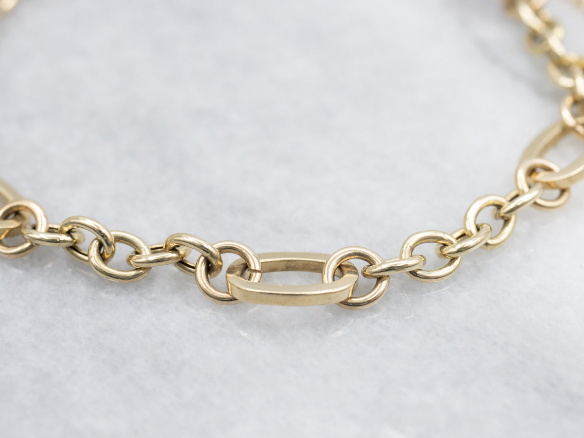 Gold Link Bracelet with Heart Lock Clasp and Safety Chain