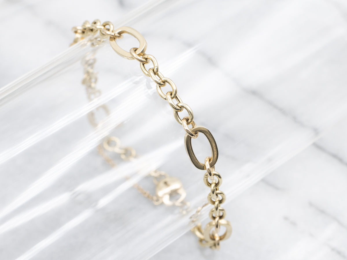 Gold Link Bracelet with Heart Lock Clasp and Safety Chain